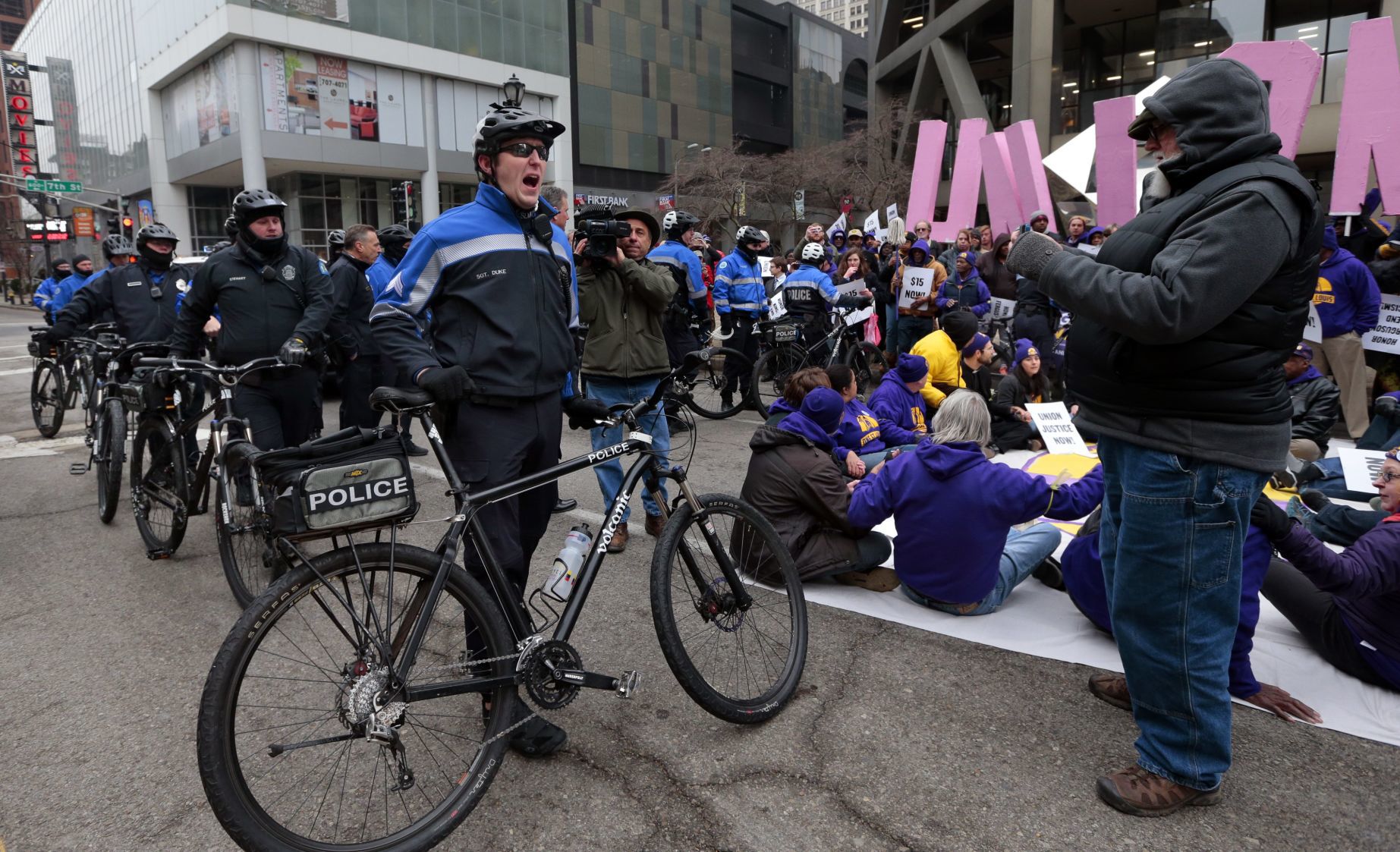 Arrests made as protesters call for pay raise for local janitors